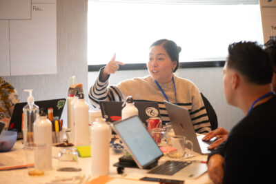 Denise Lau from DreamHouse ‘Ewa Beach charter school works with her fellow teachers at the Decision Education Incubator Retreat in Philadelphia. Photo credit: Aaron Stallworth